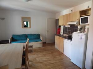 A kitchen or kitchenette at Appartement Ramel Luchon