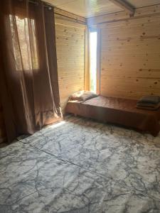 A bed or beds in a room at Eco Glamping with Pool between Nafplio and Argos