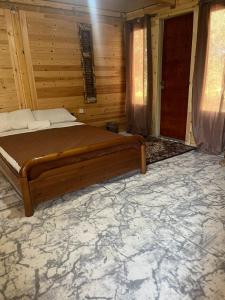 A bed or beds in a room at Eco Glamping with Pool between Nafplio and Argos