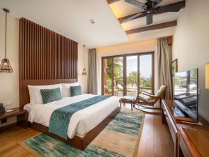 Postel nebo postele na pokoji v ubytování Mövenpick Resort Cam Ranh