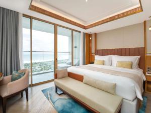 Postel nebo postele na pokoji v ubytování Mövenpick Resort Cam Ranh