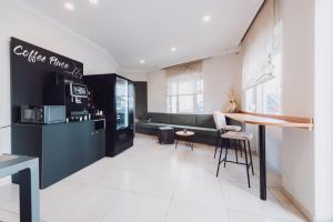 Kuchyň nebo kuchyňský kout v ubytování Ambienthotel Tassilo