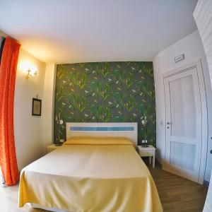 Postel nebo postele na pokoji v ubytování Aramoni B&B