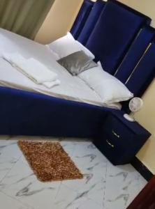 Postel nebo postele na pokoji v ubytování C&M Homes