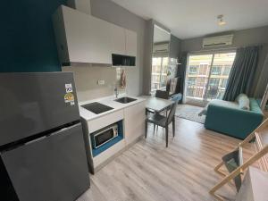 Η κουζίνα ή μικρή κουζίνα στο The most recent and luxurious apartment in Pattaya 6th Lane