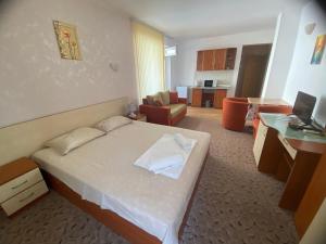 Postel nebo postele na pokoji v ubytování Art Guest House Orchidea