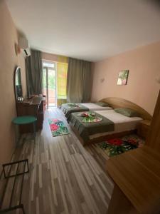 Postel nebo postele na pokoji v ubytování Art Guest House Orchidea