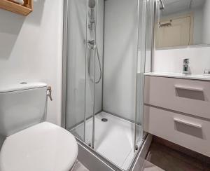 a bathroom with a shower and a toilet and a sink at Studio Centre Ville proche TRAM & Port, Wifi Gratuit in Nice +10 photos