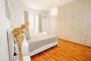 Ένα ή περισσότερα κρεβάτια σε δωμάτιο στο Wake in the Lake