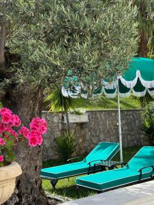 Κήπος έξω από το Monte Aria panorama suites