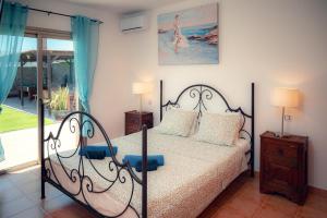 A bed or beds in a room at Villa Molly88
