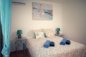 A bed or beds in a room at Villa Molly88