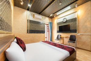 Μια τηλεόραση ή/και κέντρο ψυχαγωγίας στο Kings Hotel In City Central