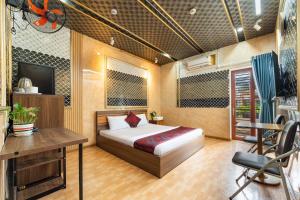 Ένα ή περισσότερα κρεβάτια σε δωμάτιο στο Kings Hotel In City Central +85 φωτογραφίες