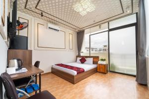 Ένα ή περισσότερα κρεβάτια σε δωμάτιο στο Kings Hotel In City Central