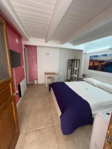 Postel nebo postele na pokoji v ubytování Le Dimore di Mariuccia Relax & SPA