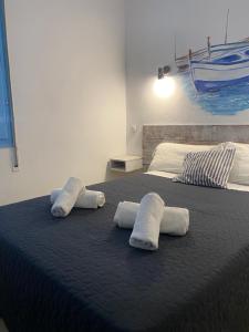 Postel nebo postele na pokoji v ubytování Hotel Bergantí