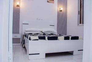 Katil atau katil-katil dalam bilik di Appartement meublé