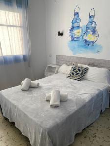Postel nebo postele na pokoji v ubytování Hotel Bergantí