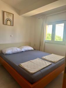 Postel nebo postele na pokoji v ubytování Apartments Buba Vir + 24 fotografií