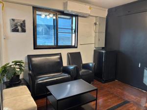Posezení v ubytování KAYAN Hostel