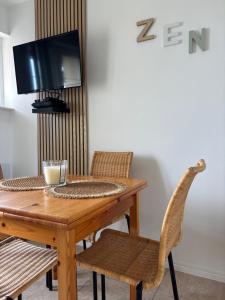 Televisyen dan/atau pusat hiburan di Vue mer - La Parenthèse Marine