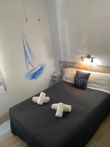 Posteľ alebo postele v izbe v ubytovaní Hotel Bergantí