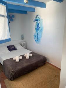 Postel nebo postele na pokoji v ubytování Hotel Bergantí