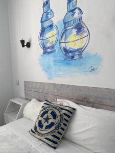 Postel nebo postele na pokoji v ubytování Hotel Bergantí