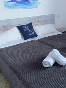 Postel nebo postele na pokoji v ubytování Hotel Bergantí