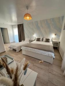 Postel nebo postele na pokoji v ubytování Halta Pescăruş Accommodation
