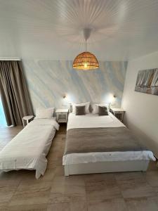 Postel nebo postele na pokoji v ubytování Halta Pescăruş Accommodation + 37 fotografií