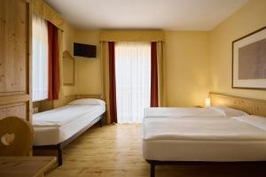 Postel nebo postele na pokoji v ubytování Garni Bellavista