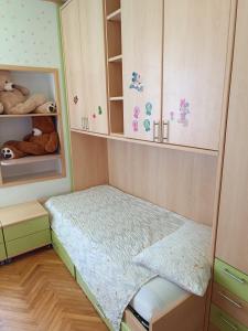 Postel nebo postele na pokoji v ubytování Apartman Paola
