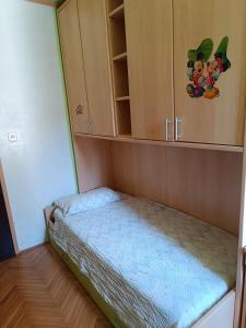 Postel nebo postele na pokoji v ubytování Apartman Paola