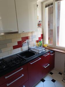 Kuchyň nebo kuchyňský kout v ubytování Apartman Paola