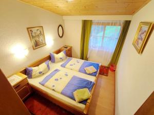 Postel nebo postele na pokoji v ubytování Group Holiday Home in Hippach with dreamy views + 37 fotografií