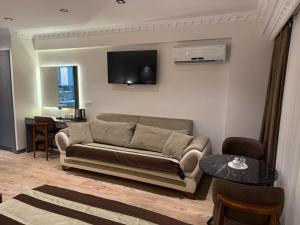 A television and/or entertainment centre at Blue Istanbul Hotel Taksim