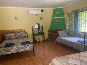 Postel nebo postele na pokoji v ubytování ΓΑΛΗΝΗ 2