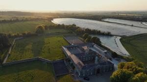 an aerial view of a large building in a field at Rokeby cottage in Drogheda