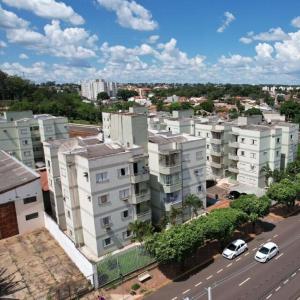 an aerial view of a city with buildings and cars at Apartment near UFMS in Campo Grande