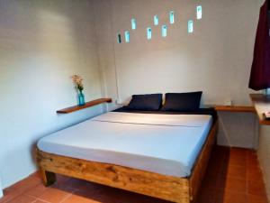 Postel nebo postele na pokoji v ubytování Dragonfly Guesthouse M'Pai Bay