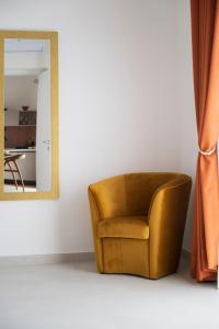 Гостиная зона в Dimora la Fenice Ambra Apartment +33 фотографии