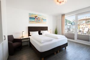 Postel nebo postele na pokoji v ubytování Hotel Meerzeit + 37 fotografií