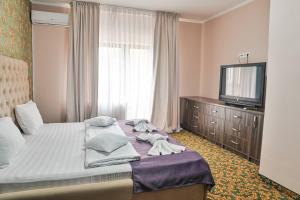 Postel nebo postele na pokoji v ubytování Hotel Aby Baile Felix