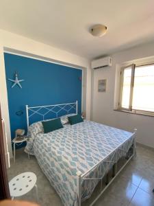 Postel nebo postele na pokoji v ubytování Chianalea Guesthouse