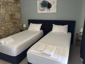 Postel nebo postele na pokoji v ubytování Mezzanine Bay