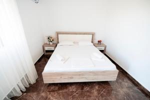 Кровать или кровати в номере Vila Maria