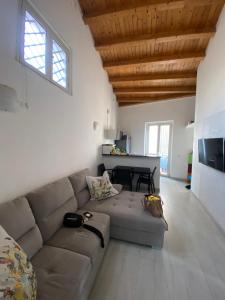 a living room with a couch and a table at La Torre in Catania