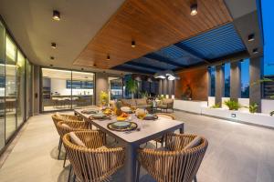 a dining room with a table and chairs at Eco Villa Supernova in Kalkan